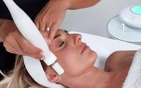 Woman receiving Bloomea facial treatment in Toronto at Red Carpet On Queen for melasma and skin rejuvenation